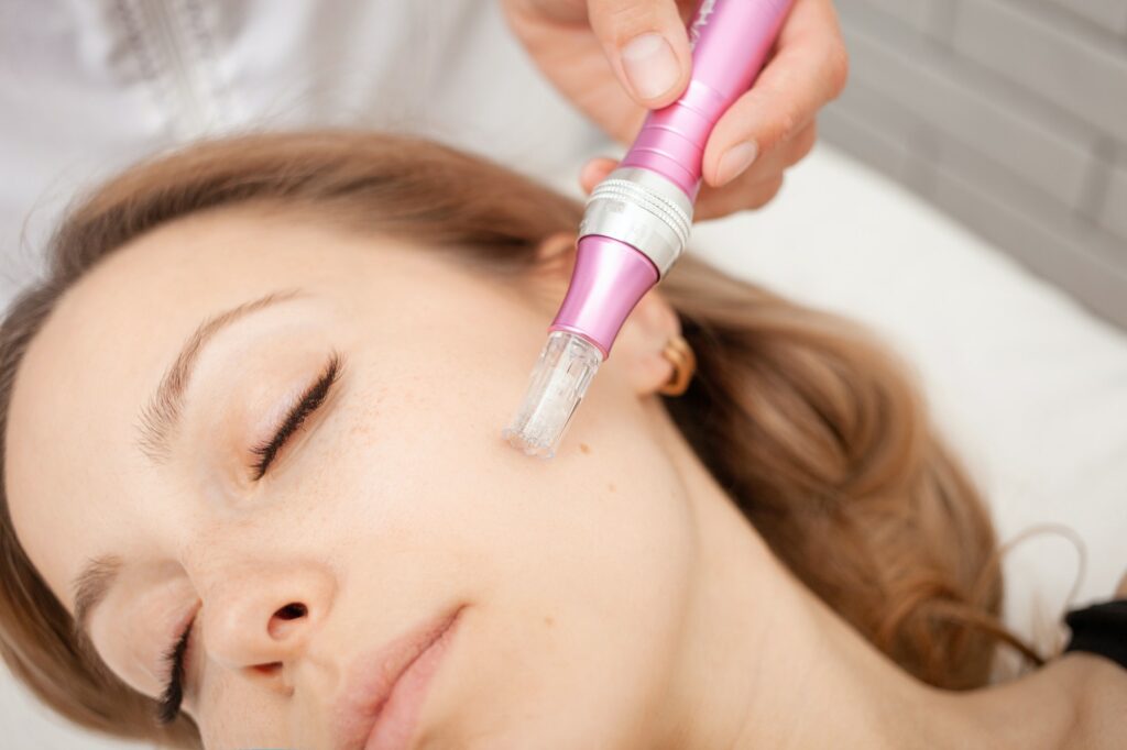 Mesotherapy in salon, cosmetologist, microneedles for rejuvenation and elimination of shortcomings