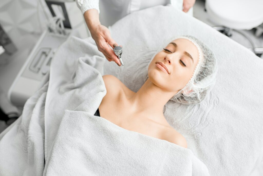 Woman during the hydration skin procedure